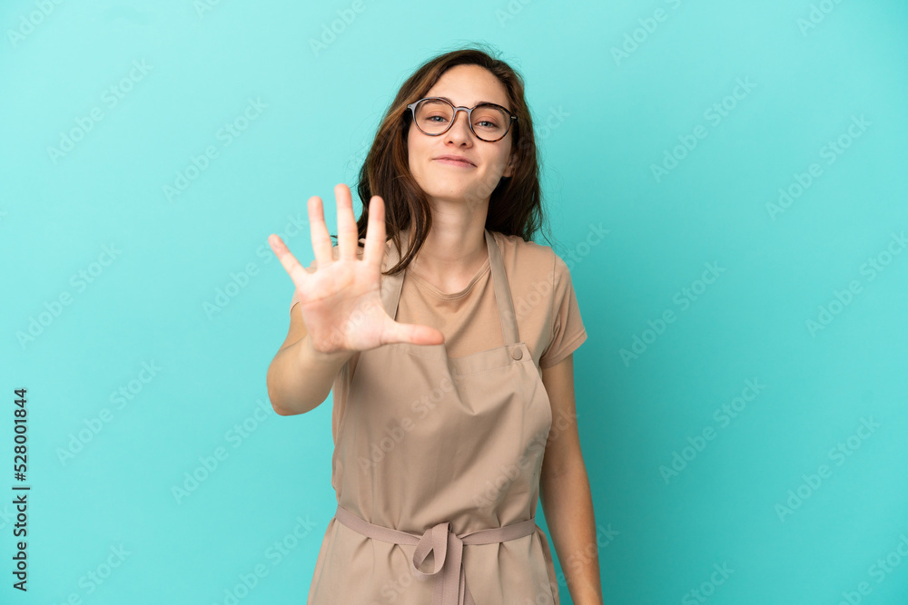 Restaurant waiter counting five with fingers Restaurant waiter counting five with fingers