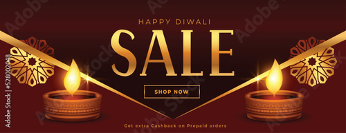 premium style diwali promotional sale banner with glowing diya