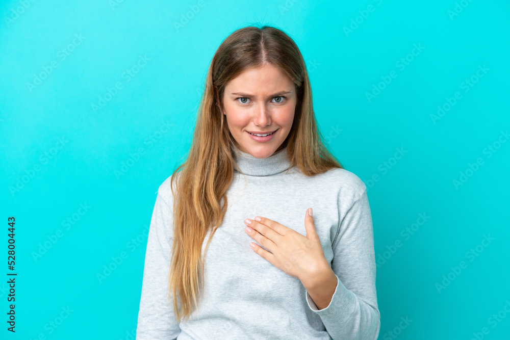 Young blonde woman isolated on blue background pointing to oneself Young blonde woman isolated on blue background pointing to oneself