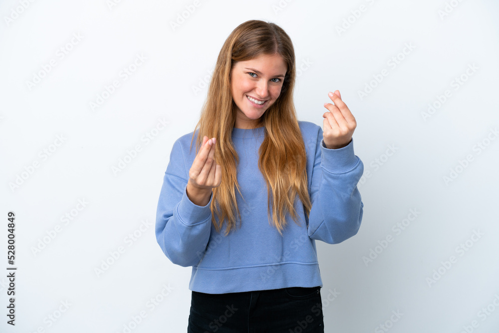 Young blonde woman isolated on white background making money gesture Young blonde woman isolated on white background making money gesture