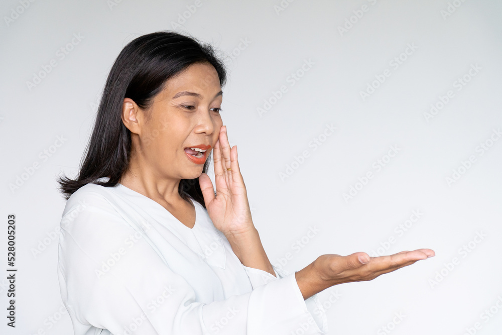 Business Woman Showing Her Hand With Excited Face on White background Business Woman Showing Her Hand With Excited Face on White background