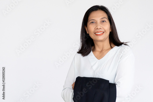 Business Woman Holding Black Suit Jacket Smiling and Sincere Face on White Background