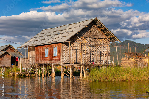 A traditional stilt house on Inle Lake in Myanmar in the Shan state of former Burma photo