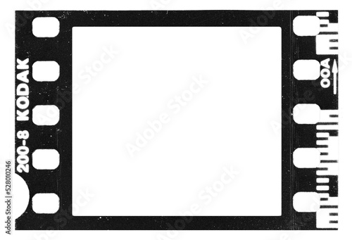 separated analog 35mm film strip frame black an white with scale and grain and damage isolated photo