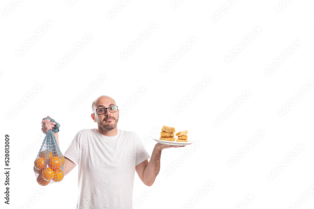 person holding fruit and processed food or fast food. mimics a scale of healthy and unhealthy food
person holding fruit and processed food or fast food. mimics a scale of healthy and unhealthy food