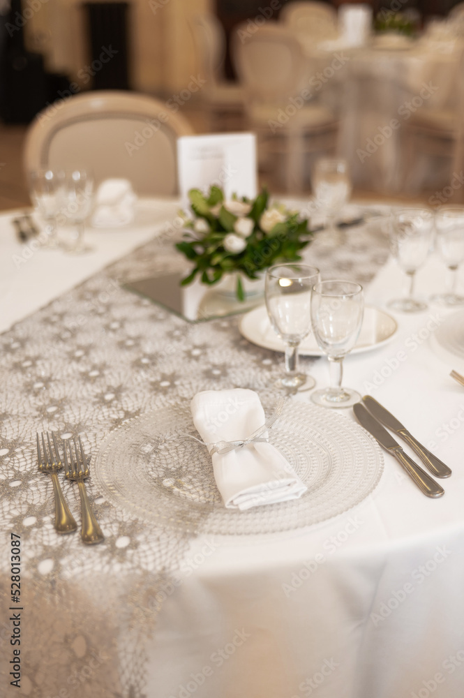 Tables set for the holiday in the restaurant Tables set for the holiday in the restaurant