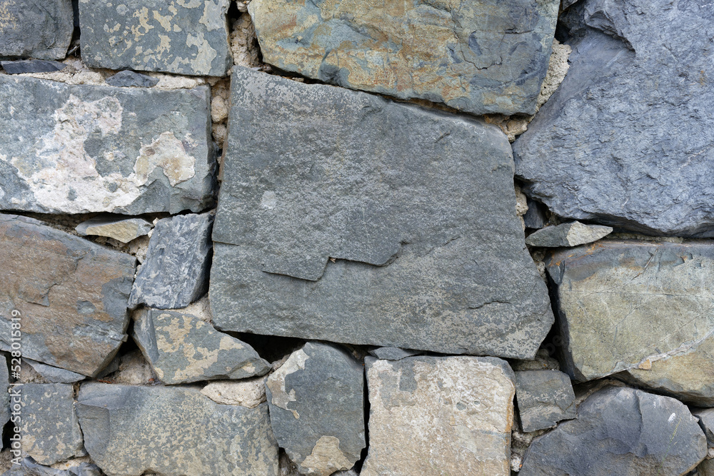 Old Stone wall brown, grey light blue colour. Old Stone wall brown, grey light blue colour.