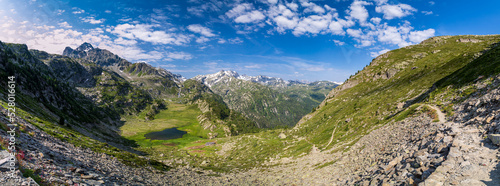 Fototapeta Naklejka Na Ścianę i Meble -  Lago dei Seracchi and behind the Rutor Glacier in a summer day