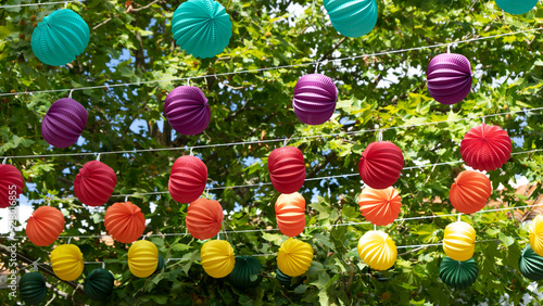 Colorful paper lanterns at a party in a village in spain