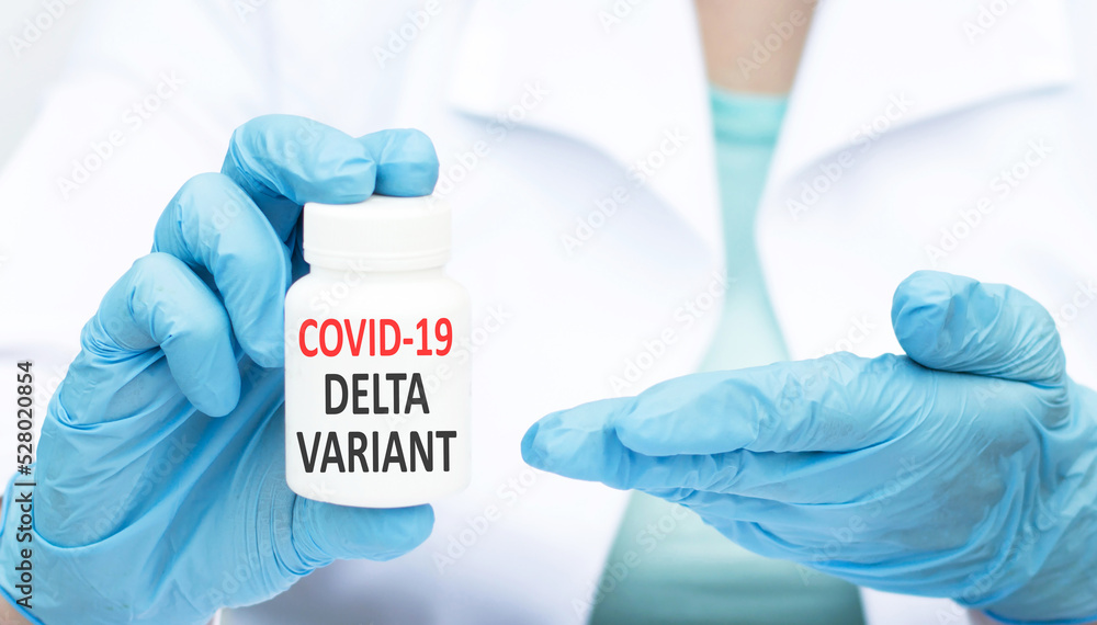 Doctor with a positive blood sample for the new variant detected of the coronavirus strain called covid DELTA. Research of new strains and mutations of the Covid 19 coronavirus in the laboratory Doctor with a positive blood sample for the new variant detected of the coronavirus strain called covid DELTA. Research of new strains and mutations of the Covid 19 coronavirus in the laboratory