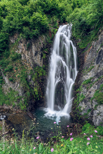 Picturesque waterfall in the mountains.  Saut deth Pish 