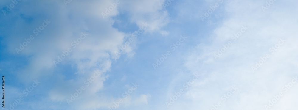 Abstract blue sky white cloud on the light of the sun background with empty copy space for add text or advertise design creative