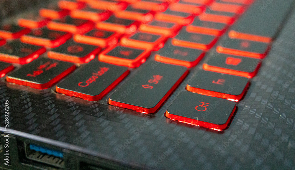 Shift button visible on laptop's red keyboard light Shift button visible on laptop's red keyboard light
