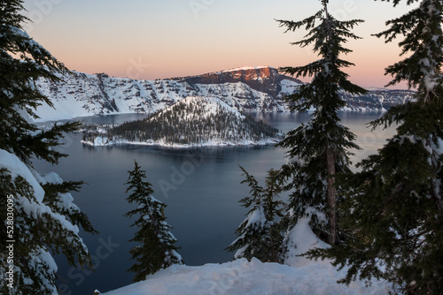 Beautiful sunset view in the Crater Lake in winter. Location is the Crater Lake National Park, Oregon