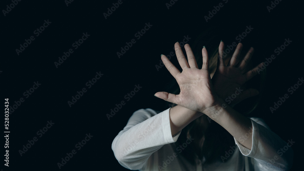 Stop hurting woman! young female person raised her hand for stop violence, sexual abuse, human trafficking, domestic violence and rape, International Day for the Elimination of Violence against Women Stop hurting woman! young female person raised her hand for stop violence, sexual abuse, human trafficking, domestic violence and rape, International Day for the Elimination of Violence against Women