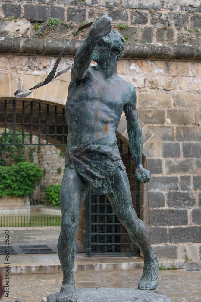 Palma de Mallorca, Mallorca, Spain - 05.03.2022: Es Foner (The Slinger) statue in Palma de Mallorca, Spain