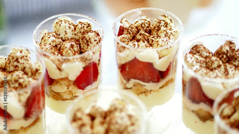 close-up, a variety of delicious desserts, cakes with cream, chocolate and strawberries. whipped cream with cinnamon. festive decor, a sweet bar, a corner, a treat. High quality photo close-up, a variety of delicious desserts, cakes with cream, chocolate and strawberries. whipped cream with cinnamon. festive decor, a sweet bar, a corner, a treat. High quality photo