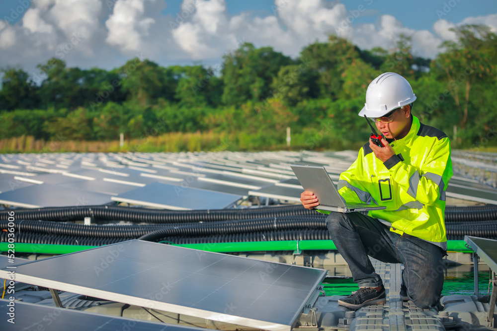 Portrait of professional man engineer working checking the panel Portrait of professional man engineer working checking the panel