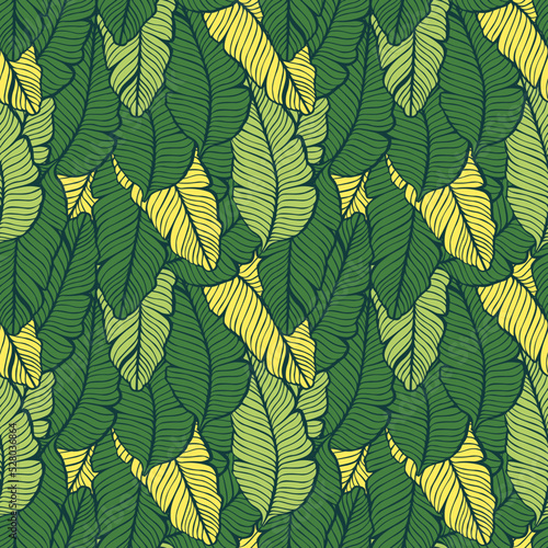 Seamless colored natural pattern of leaves or feathers 