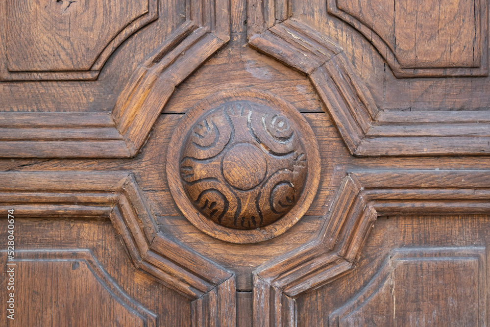 Naklejka premium Closeup of an old ancient wooden door.