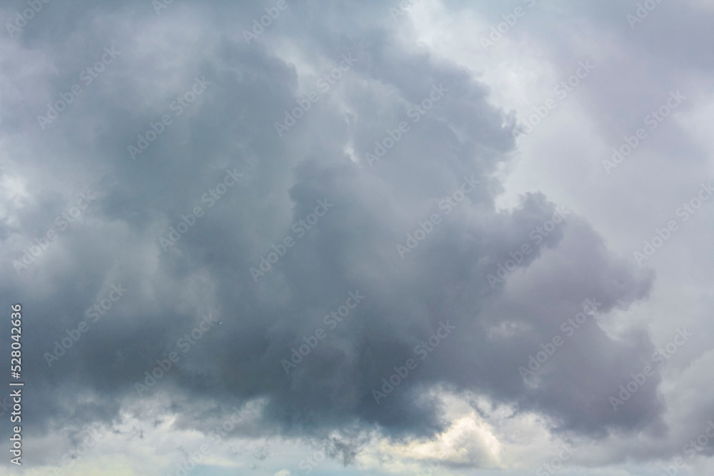 Heavy rain thunderstorm dark storm clouds wind in Germany.