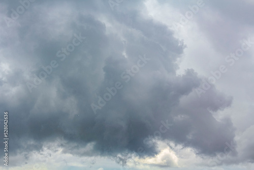 Heavy rain thunderstorm dark storm clouds wind in Germany. © arkadijschell