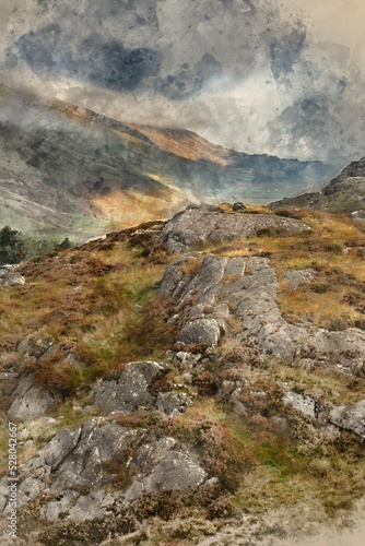 Digital watercolour painting of Epic Autumn landscape image of view along Nant Fracon valley in Snowdonia National Park with dramatic evening sky and copy space