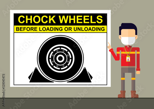 Safety trainer personnel explain the chock wheels safety regulation.