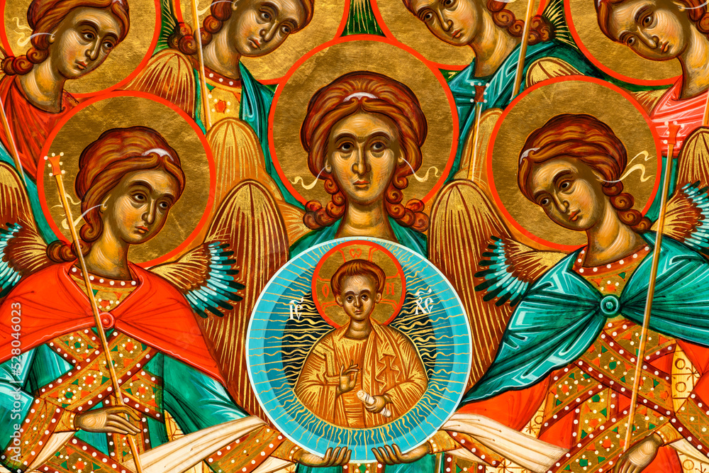Close-up detail of an orthodox icon depicting the Synaxis of the Holy Archangels painted in the Byzantine style.