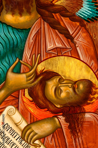 Byzantine Style Orthodox Icon depicting St. John the Baptist, detail of the severed head. photo