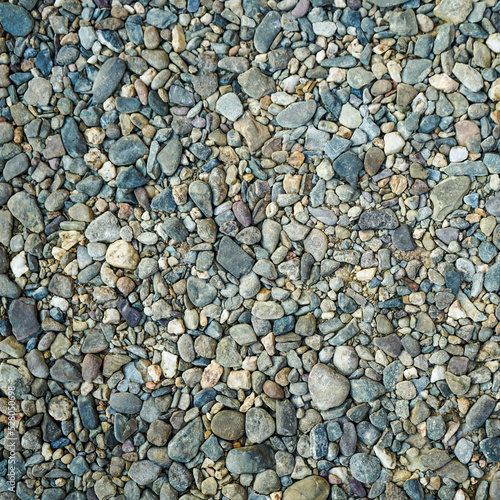 gray pebbles stone or river stone background with vintage filter 