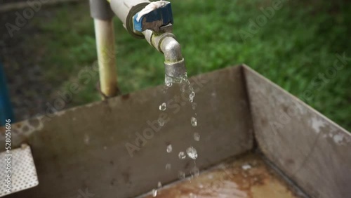 high angle view footage of gurgling water from a slightly open faucet