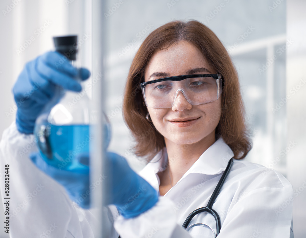 Chemist works in hospital pharmacology science research lab. Woman medical scientist or researcher analyzing innovative virus protective vaccines in health care biology laboratory. Medicine discovery. Chemist works in hospital pharmacology science research lab. Woman medical scientist or researcher analyzing innovative virus protective vaccines in health care biology laboratory. Medicine discovery.