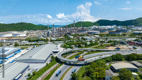 Industry and Transportation view. Truck and Vihicle on the road surrounded Industry Manufacturing Factory Warehouse and Cargo Container shipyard. Industrial logistics transportation seaport Business