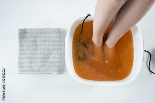 Billede på lærred procedure of ionic detox foot bath machine in spa beauty center isolated