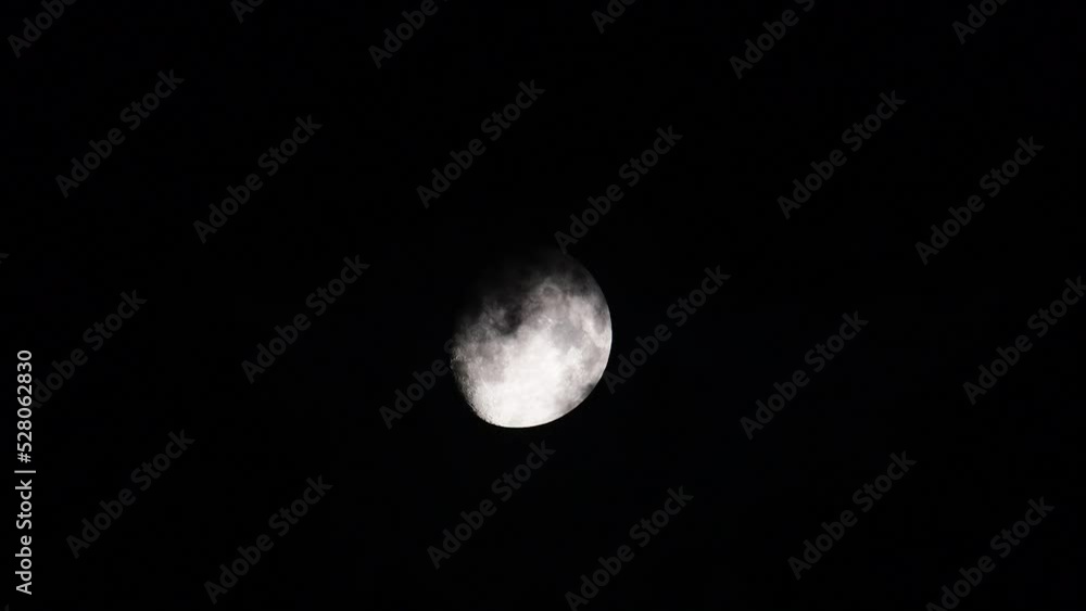 Full moon, clouds move in front of the moon and hide the whole. Full moon, clouds move in front of the moon and hide the whole.