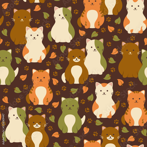 Seamless pattern with colorful cute cats and autumn leaves. Vector illustration.