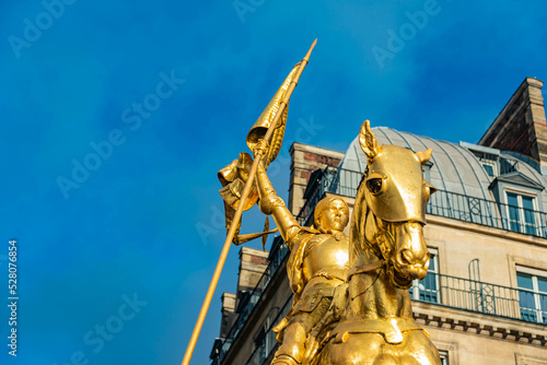 golden statue of joan the arch paris memorial midevil knight photo