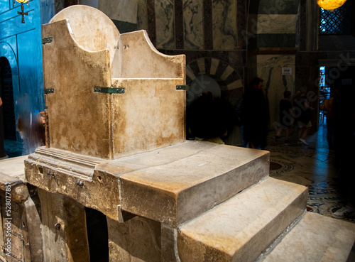 The Aachen royal throne, also known as the throne of Charlemagne, is a throne erected in the 790s on behalf of Emperor Charlemagne, which forms the center of today's Aachen Cathedral