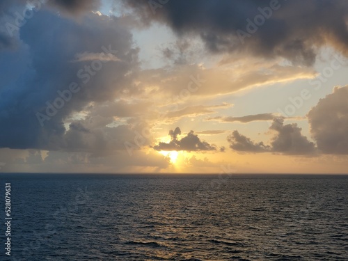 Sunset over Ocean Water Clouds