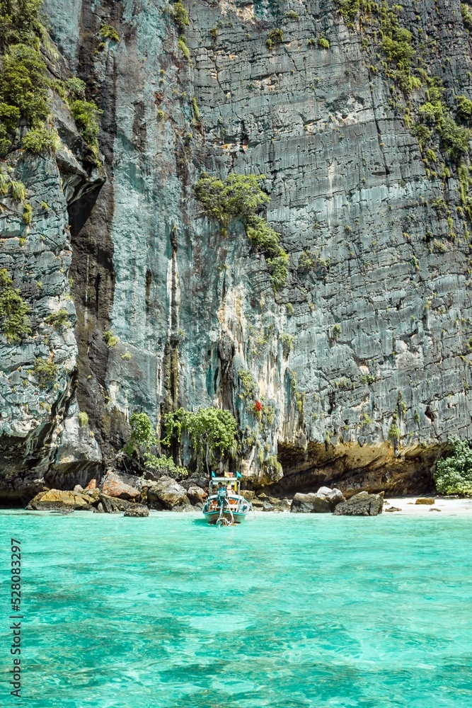 Beach, rocks and turquoise water on Phi Phi islands in Thailand