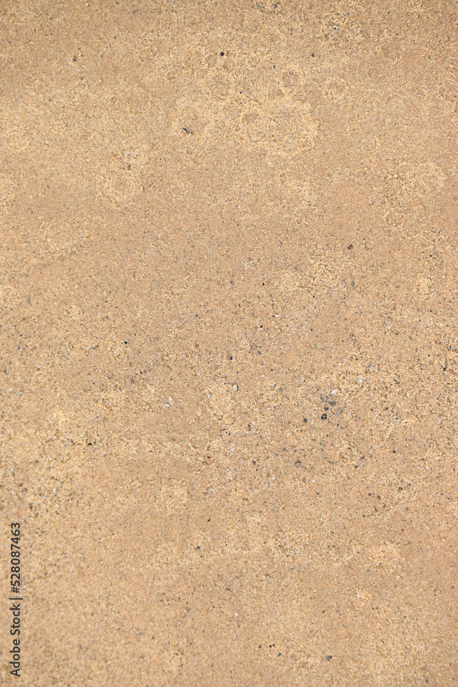 closeup the red brown color wet sand soft focus natural red brown background. closeup the red brown color wet sand soft focus natural red brown background.