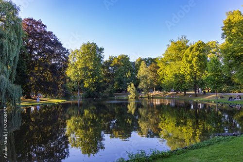 Fototapeta Naklejka Na Ścianę i Meble -  Landscape of public park Noorderplantsoen in Groningen city in The Netherlands at a sunny evening in summer