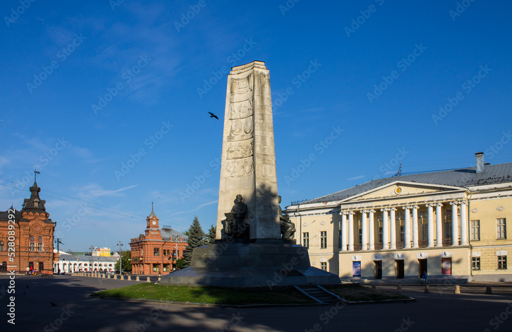 VLADIMIR, RUSSIA - AUGUST, 17, 2022: Cathedral Square in the old town with a stele with bronze statues on a sunny summer day