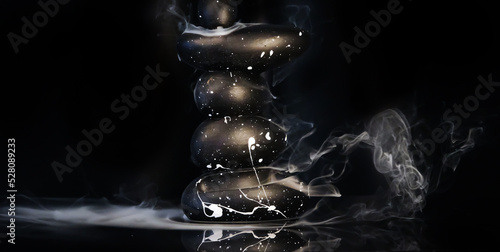 Photography incense smoke flowing over zen stones