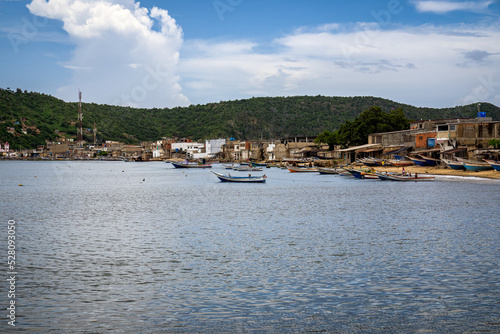 View of Carupano dock. Boats anchored near to shore. Sucre State, Venezuela