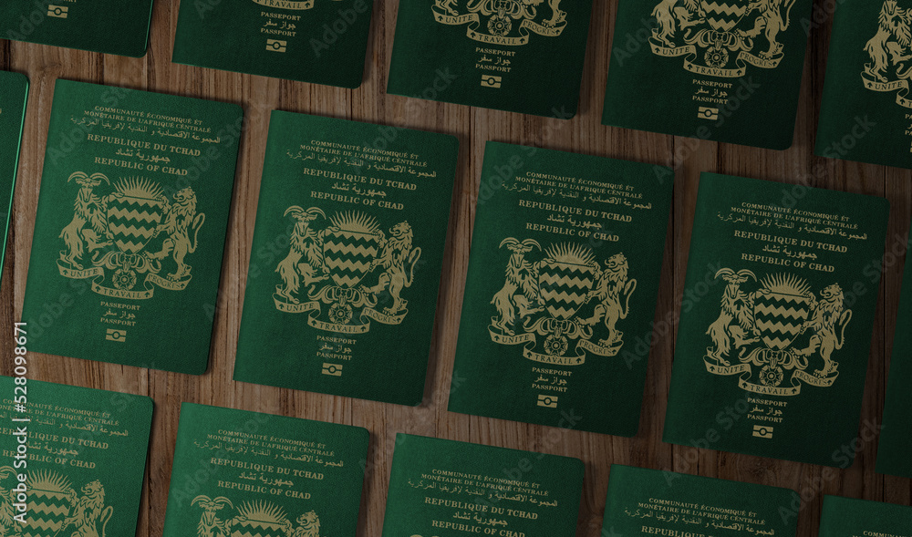 Obraz premium Chad country passports, top view, on a wooden table