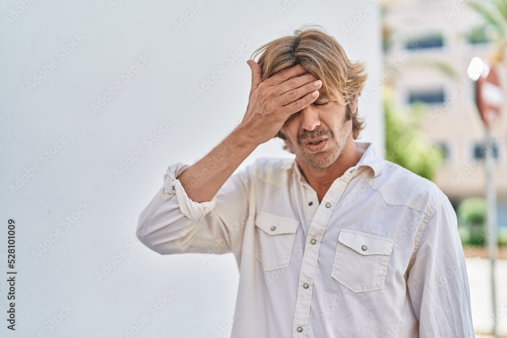 Young man coughing at street Young man coughing at street