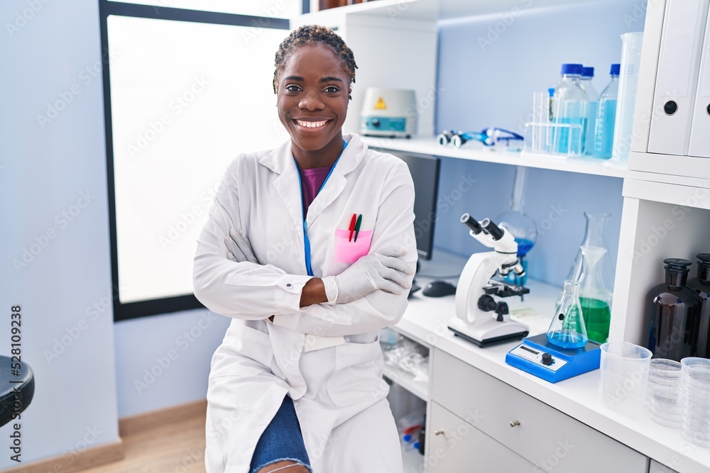 custom made wallpaper toronto digitalAfrican american woman wearing scientist uniform standing with arms crossed gesture at laboratory