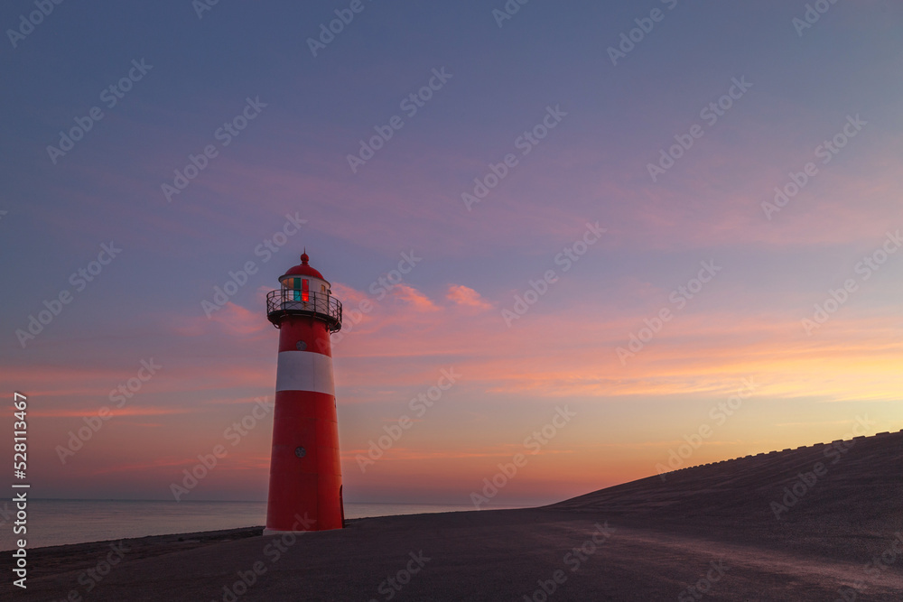 Lighthouse at sunrise at Westkapelle, Netherlands